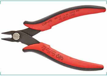 A wire cutter with red handles